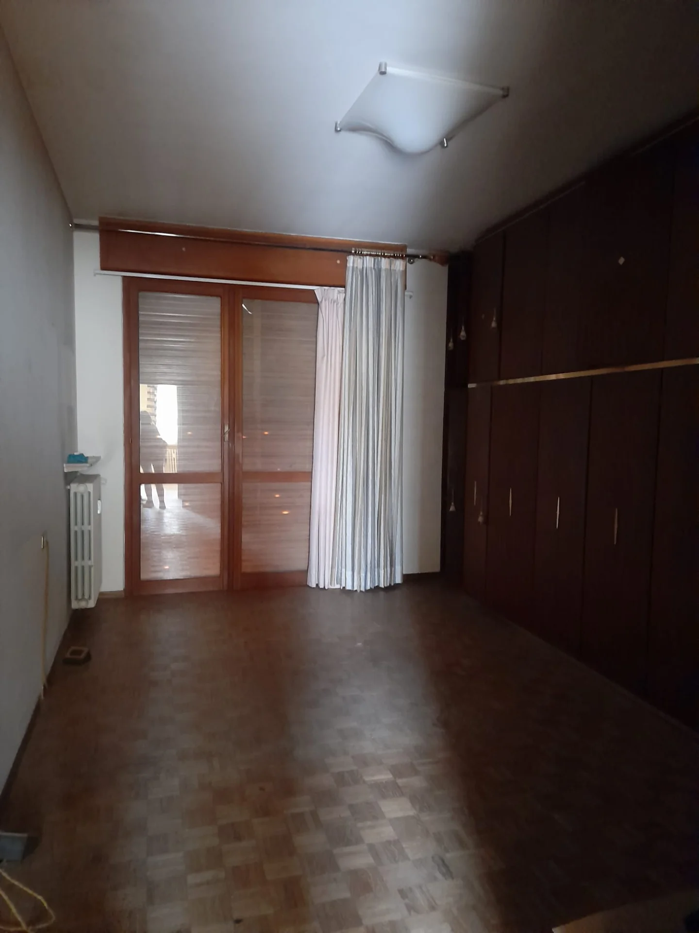 Luminoso appartamento al piano alto con balconi e cantina